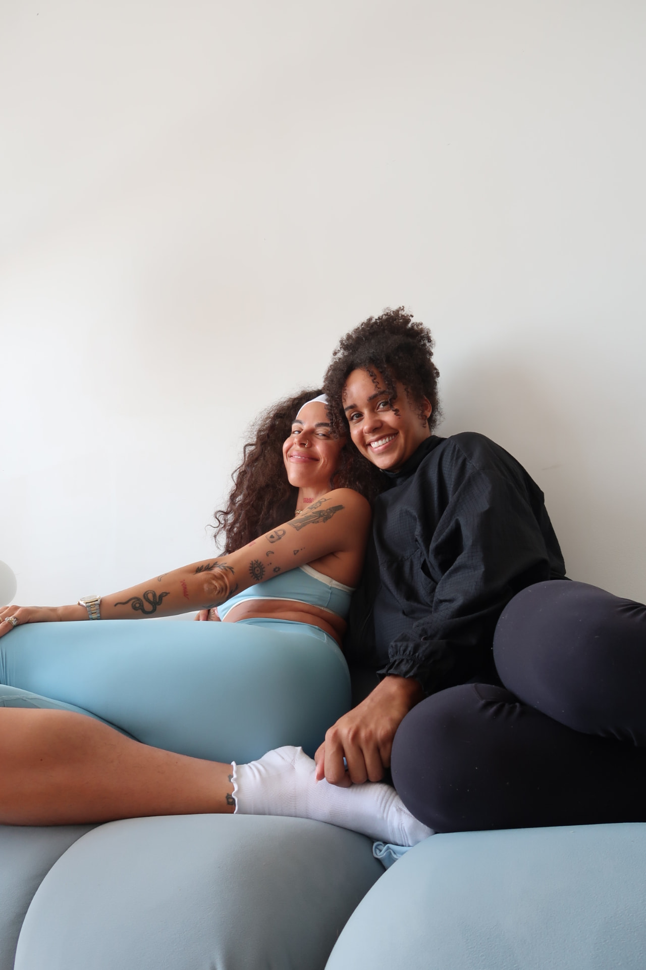Johanna Ricouz and Jessica Joseph seated together at Soul Therapy Studios